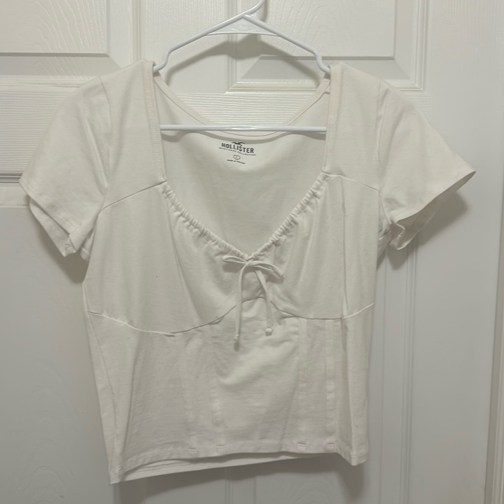 White, cropped, corset like, hollister, good condition.